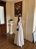 Tea Break French Small Flying Sleeves Dot Joint Dress Women's Summer 2026 New Niche Design Feeling Waist Skirt