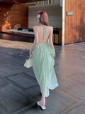 Sanya Seaside Photo Fairy Skirt Atmosphere Feel Dopamine Island Wearing A Beach Dress Bare Back Hanging Neck Dress