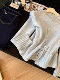Gentle Wind Pumping Rope Lotus Leaf Side Design Sweater Women Autumn And Winter 2026 New Waist Thin Knitted Shirt Top