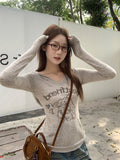 Korean Pure Desire V-Neck Collar Collar Collar Collared Collared Knitted Knitted Shirt 2026 Spring And Autumn Embroidery Repair Slime Inside Cloth