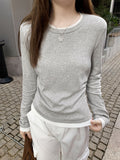 Collider Splicing And Fake Two Shoulder Long-Sleeved T-Shirts For Girls Spring Folds To Collect The Waist Thin Round Collar Inside The Top Of The Top