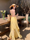French Beautiful Yellow Sling Dress Woman's Tide 2026 New Seaside Holiday Sexy Bare Back Irregular Dress