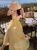 French Beautiful Yellow Sling Dress Woman's Tide 2026 New Seaside Holiday Sexy Bare Back Irregular Dress