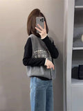 Korean Literary And Artistic Temperament Knitted Vest Vest Women Spring And Autumn Folded Through The Horse Clip Niche Design Sweater Shoulder