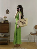 French Lotus Leaf Side Green Flowers Hanging Joint Dress Women's Summer 2026 New Beach Resort Beach Dress